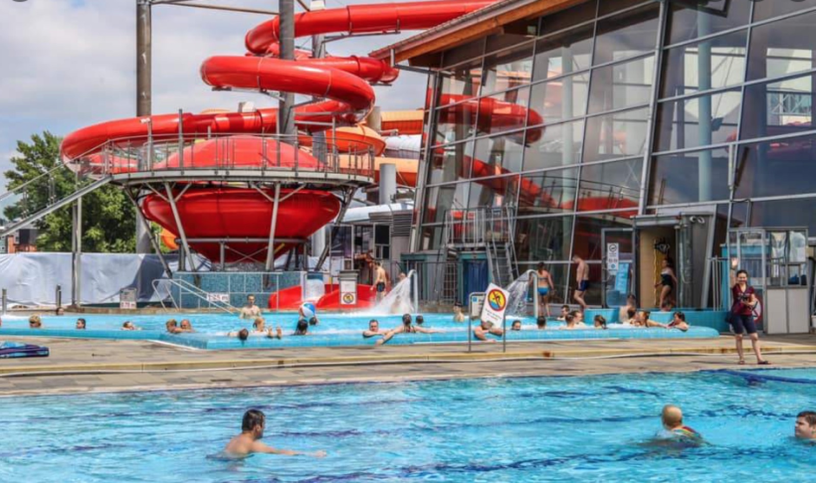 Outdoor pool and waterslide at Wrocław Aquapark