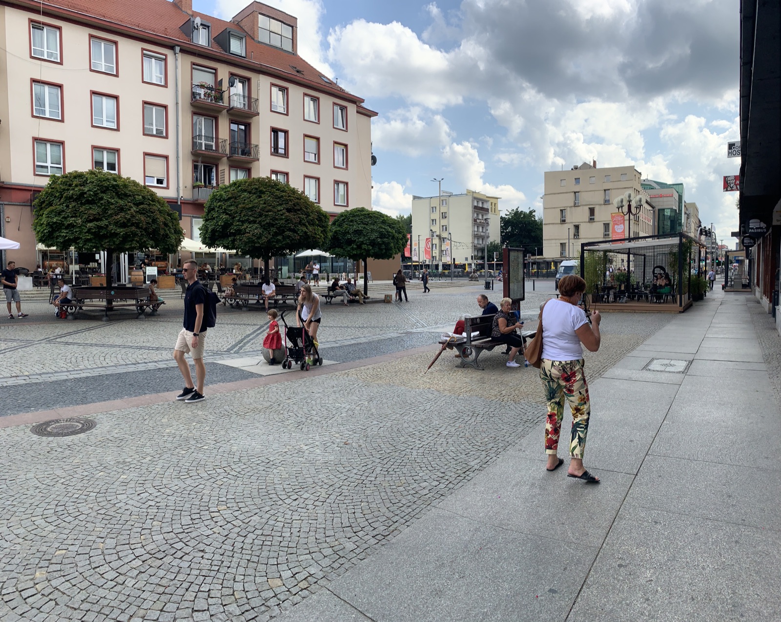 A nearby central Wrocław street and tram crossing