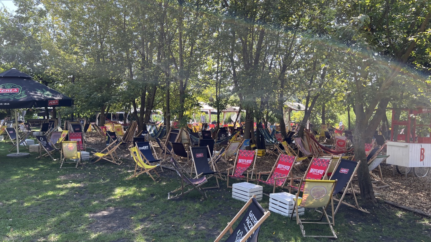 Seating beneath the beach-bar canopy